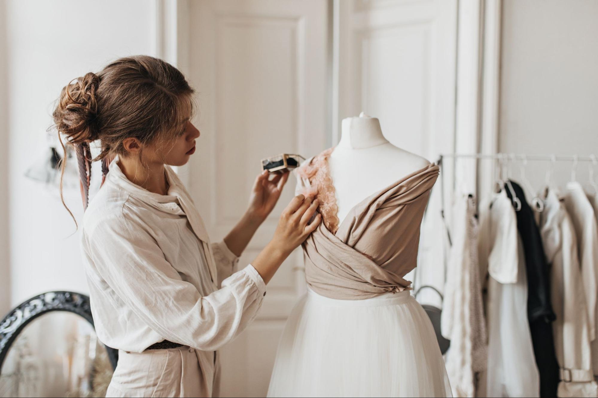 A female designer creating an outfit in a studio