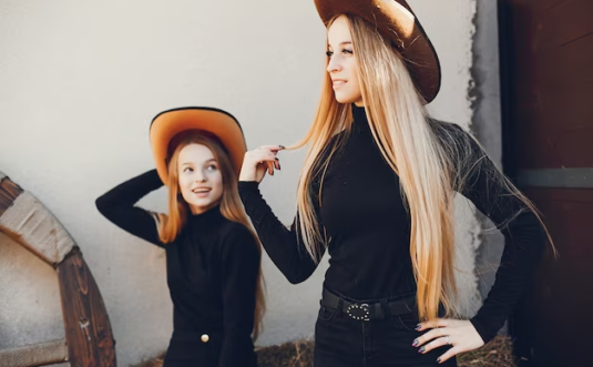 Two girls in cowboy hats