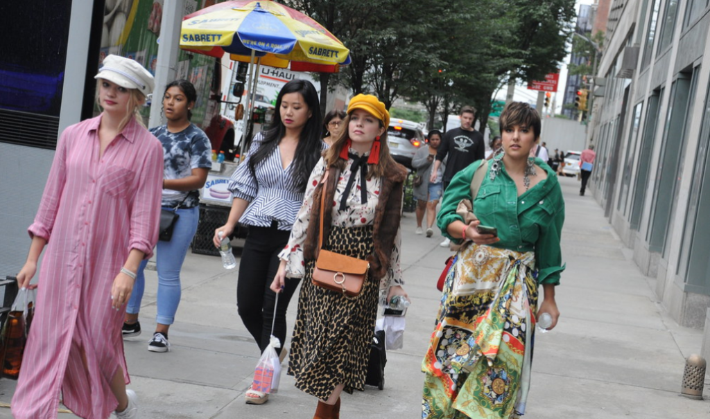stylishly dressed women walking down the street during New York Fashion Week 2018